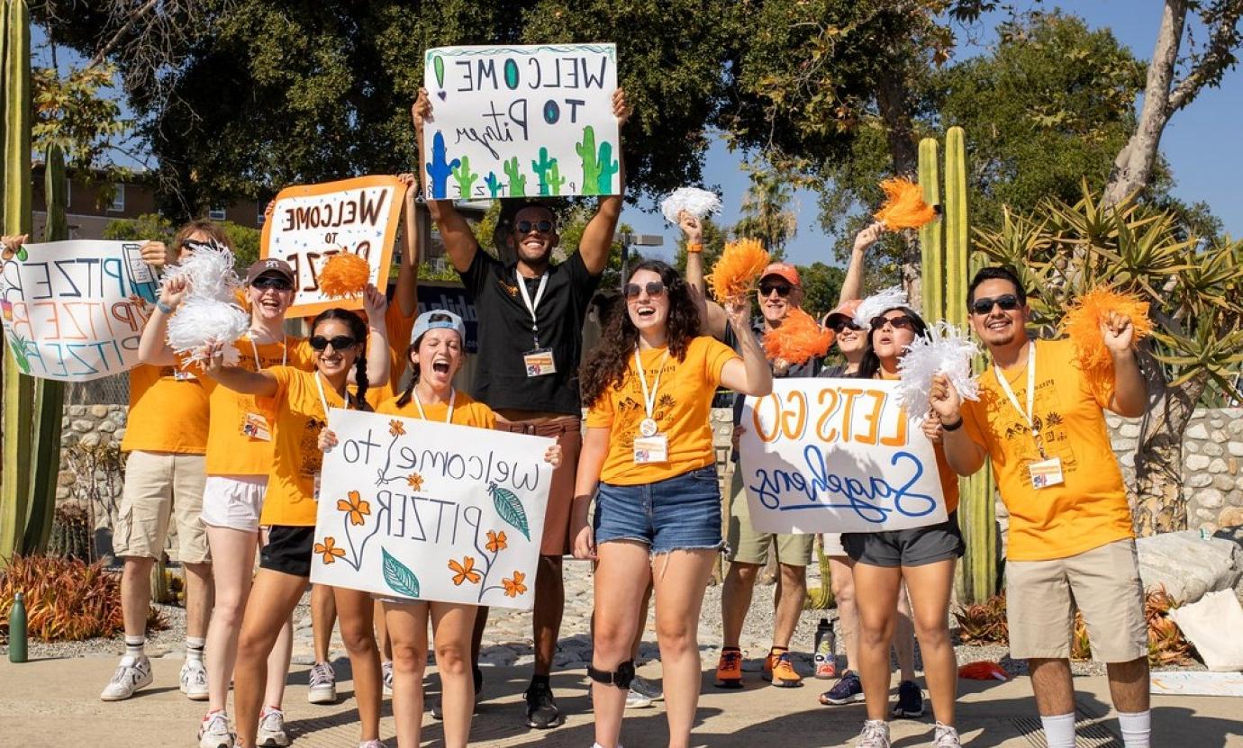 students with welcome signs